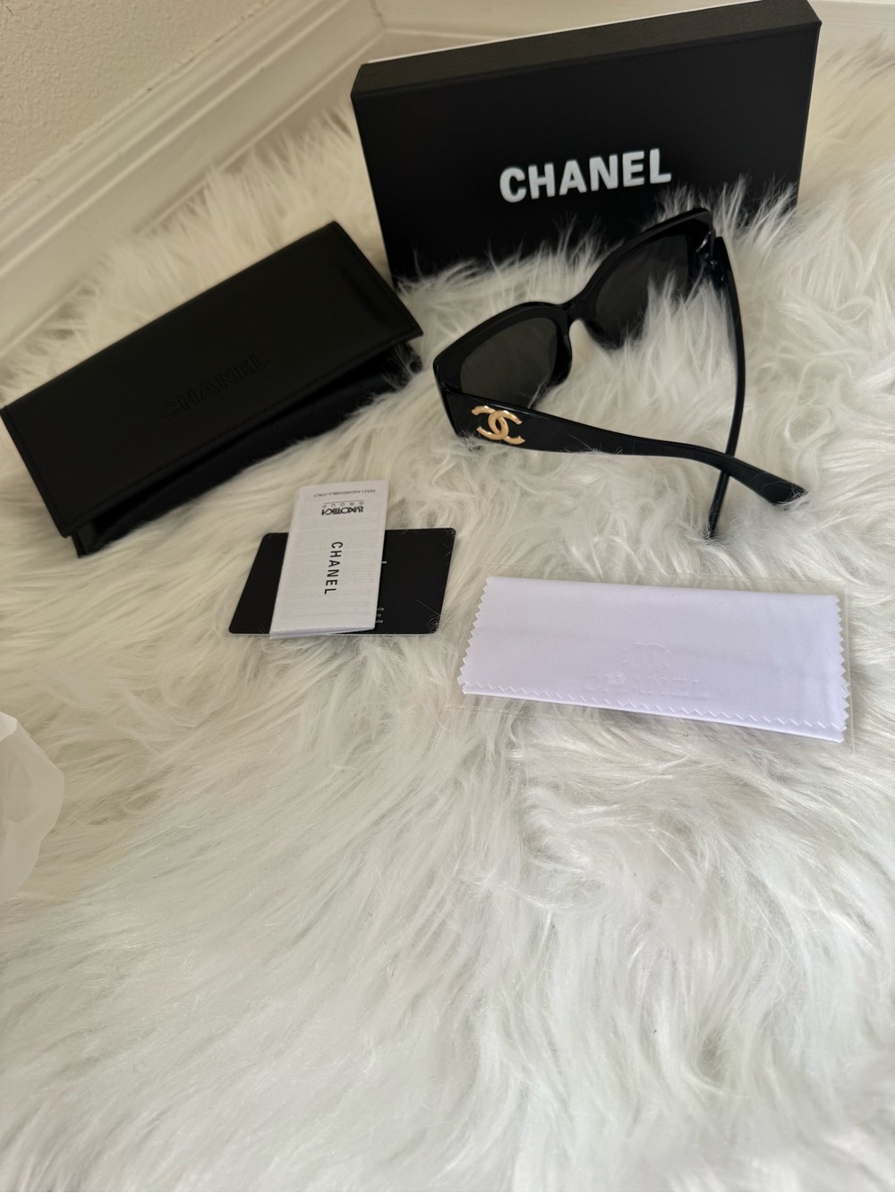 CHANEL Black Cat-Eye Sunglasses with Gold CC Accent